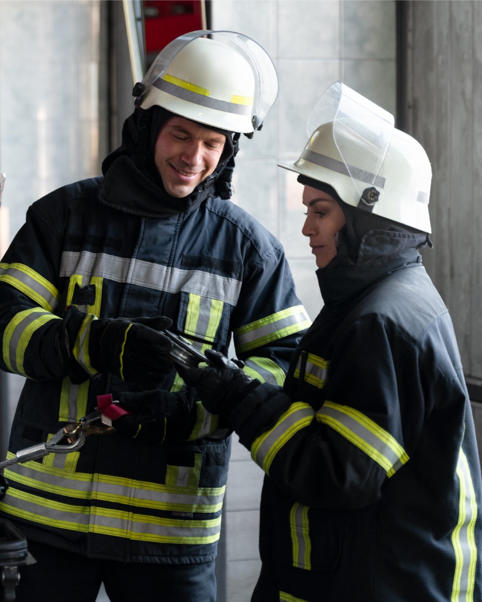 male-female-firefighters-working-together-suits-helmets_3